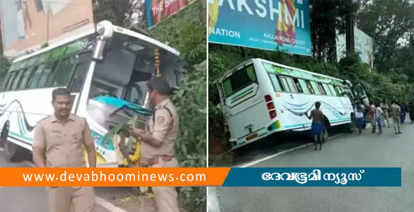 താമരശ്ശേരി ചുരത്തിൽ ശബരിമല തീര്‍ത്ഥാടകർ സഞ്ചരിച്ച ബസ് അഴുക്ക് ചാലിൽ കുടുങ്ങി